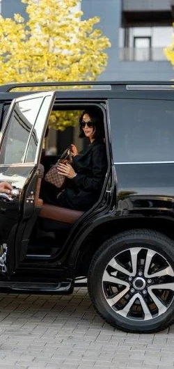 Private black SUV transportation for airport, business, and event travel